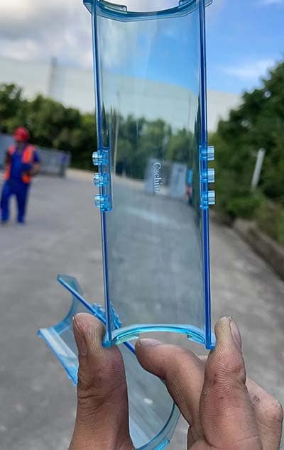 Polycarbonate (PC material) known for its exceptional combination of toughness, transparency, and heat resistance.